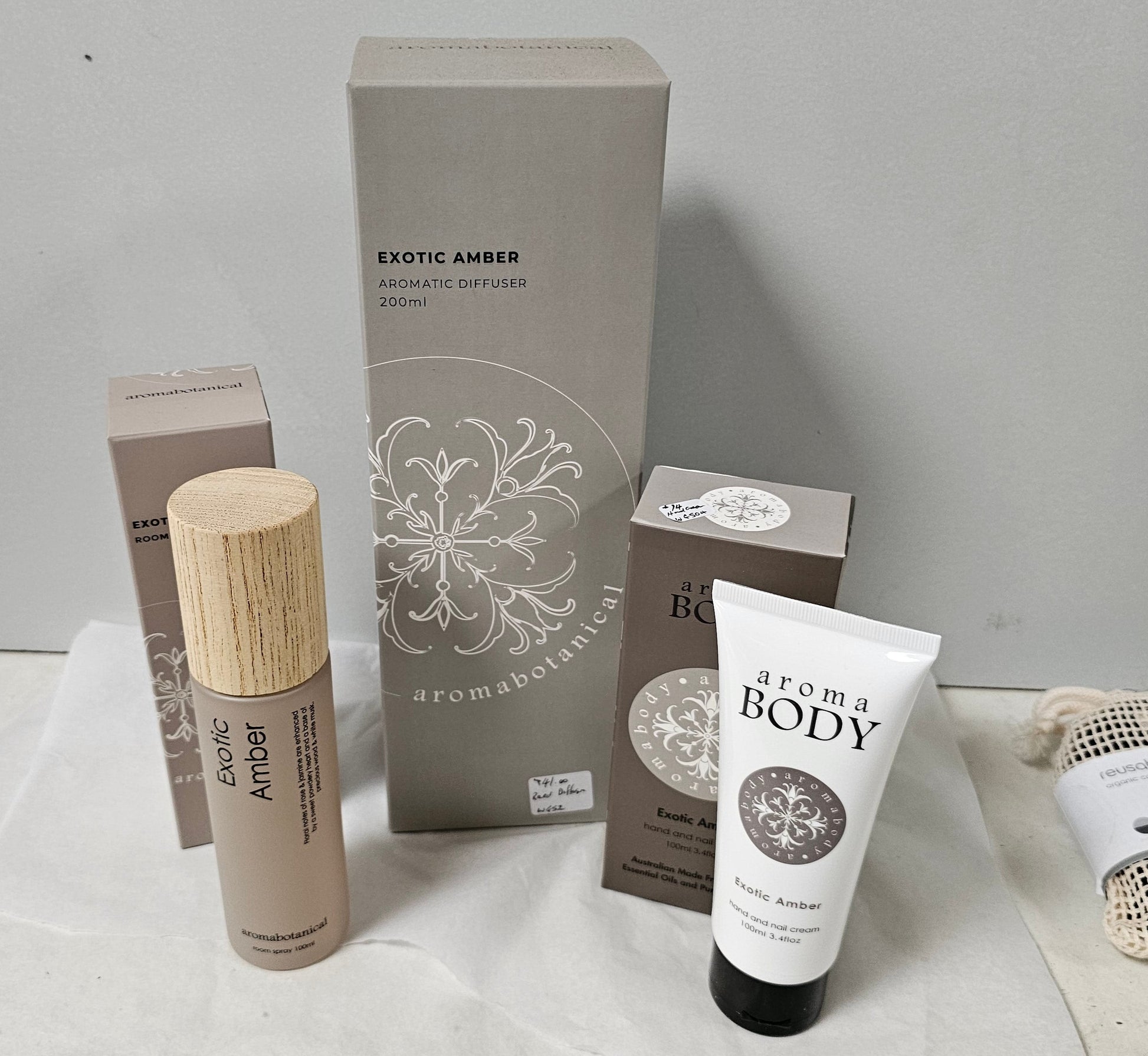 Exotic amber roomspray, diffuser, hand and body cream