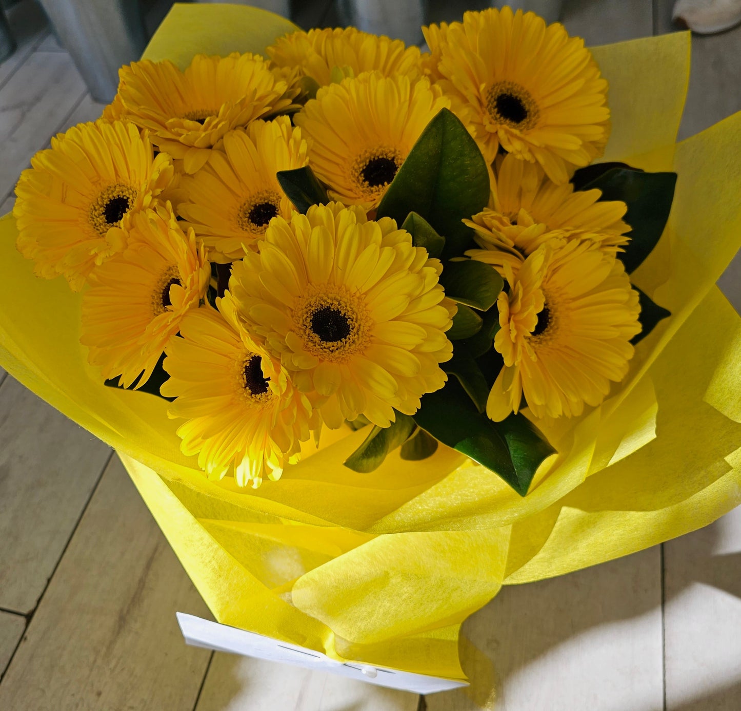 yellow gerberas can be chosen instead of sunflowers, when sunflowers are out of season.