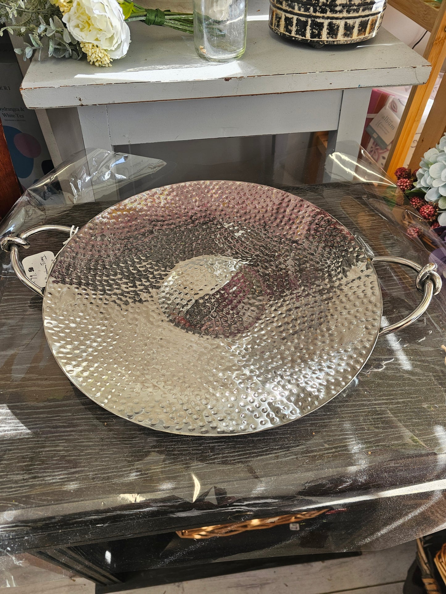 Decorative silver beaten tray with handles