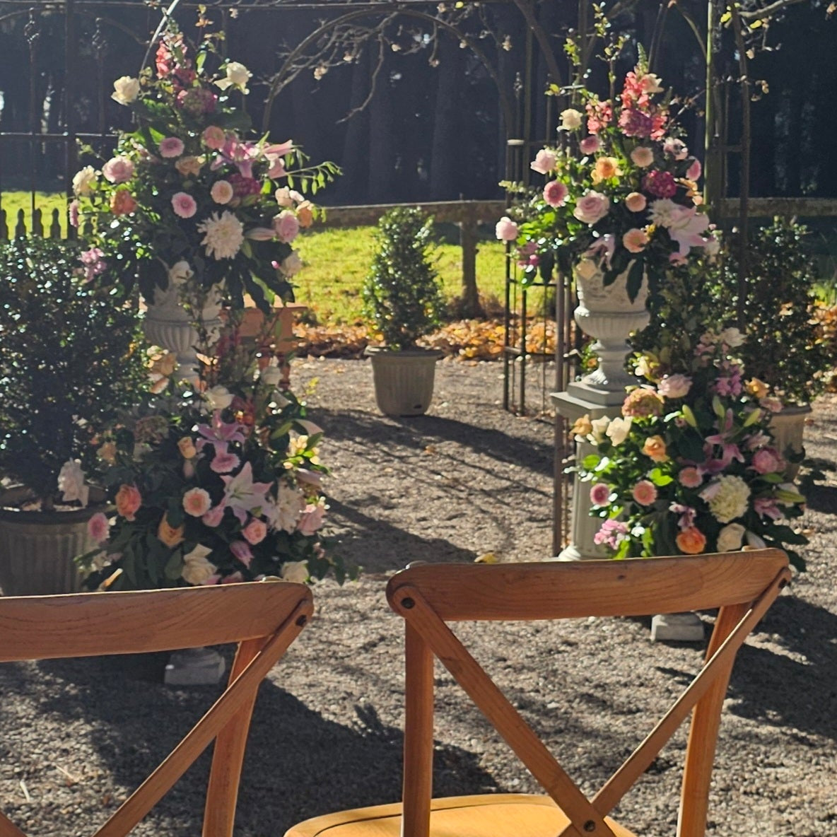 $ arrangements to decorate archway pink and white