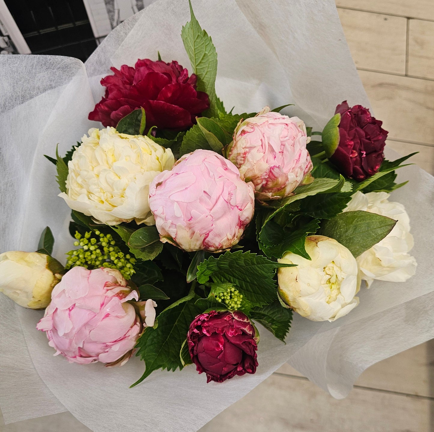 Seasonal flowers, a bouquet of - Paeonies, Freesias or Tulips