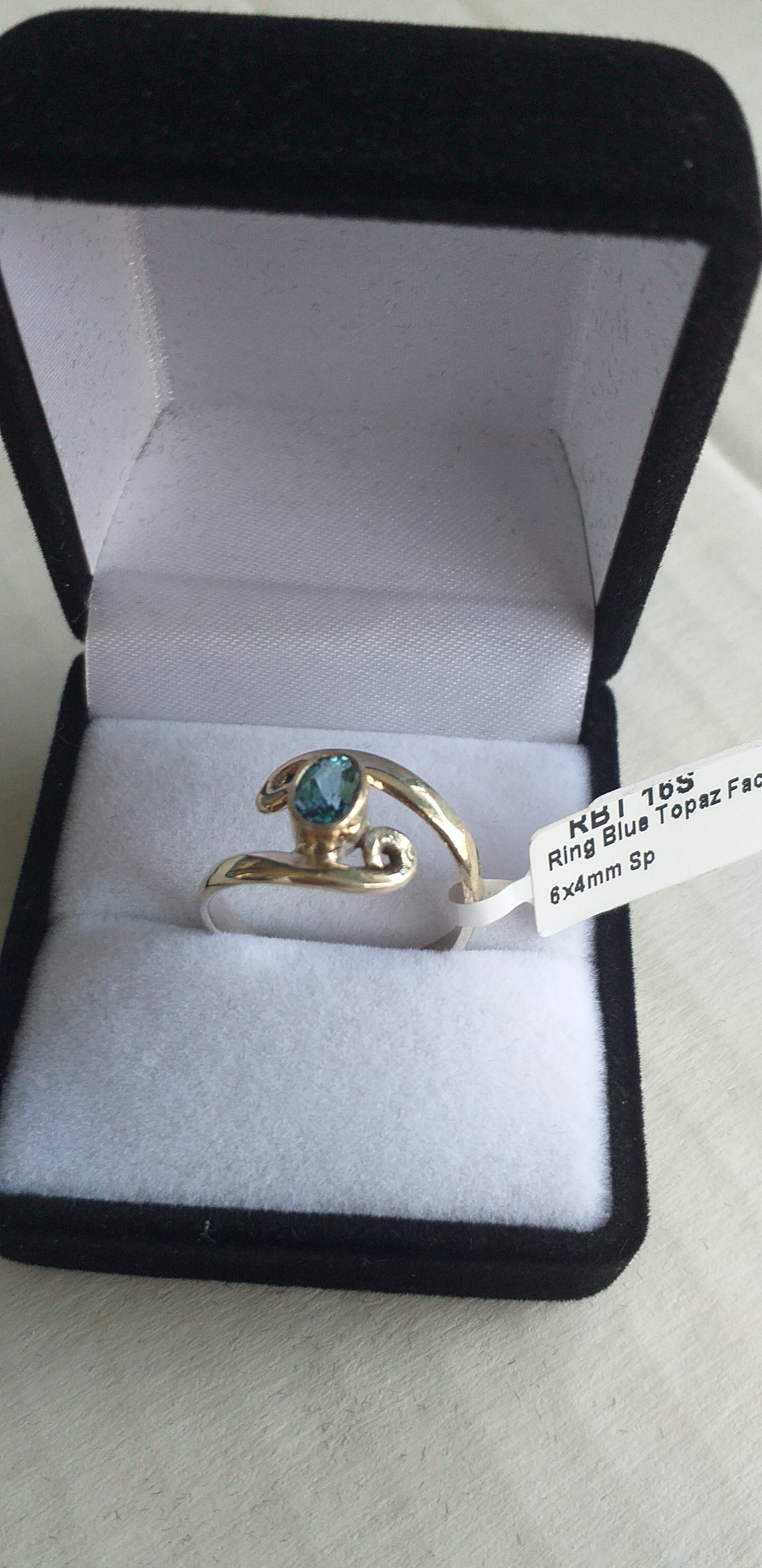 Ring, Blue Topaz spiral band in Sterling Silver, - Broadfield Flowers Florist Lincoln