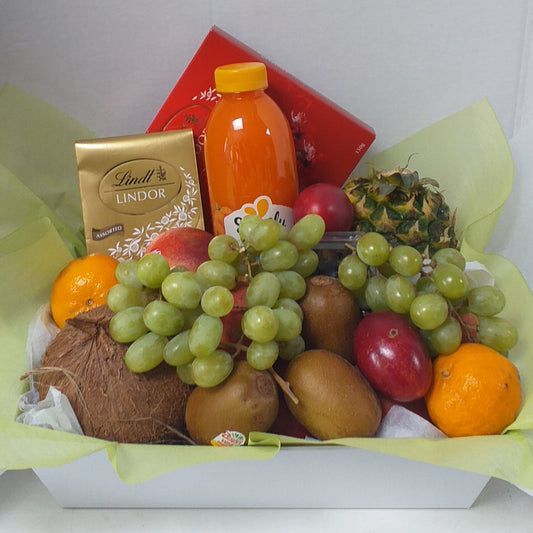 Seasonal Fruit ray, kiwi fruit, peaches, nectarines or tamarillos, mandarins, apples, pineapple or strawberries, chocolates and fruit juice