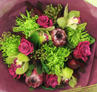 Funkalicious flower bouquet, green chrysthemum, pink proteas, roses, green orchids, wrapped in green and pink