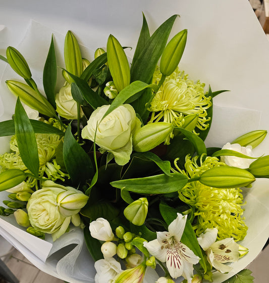 A delightful green and white flower boquet