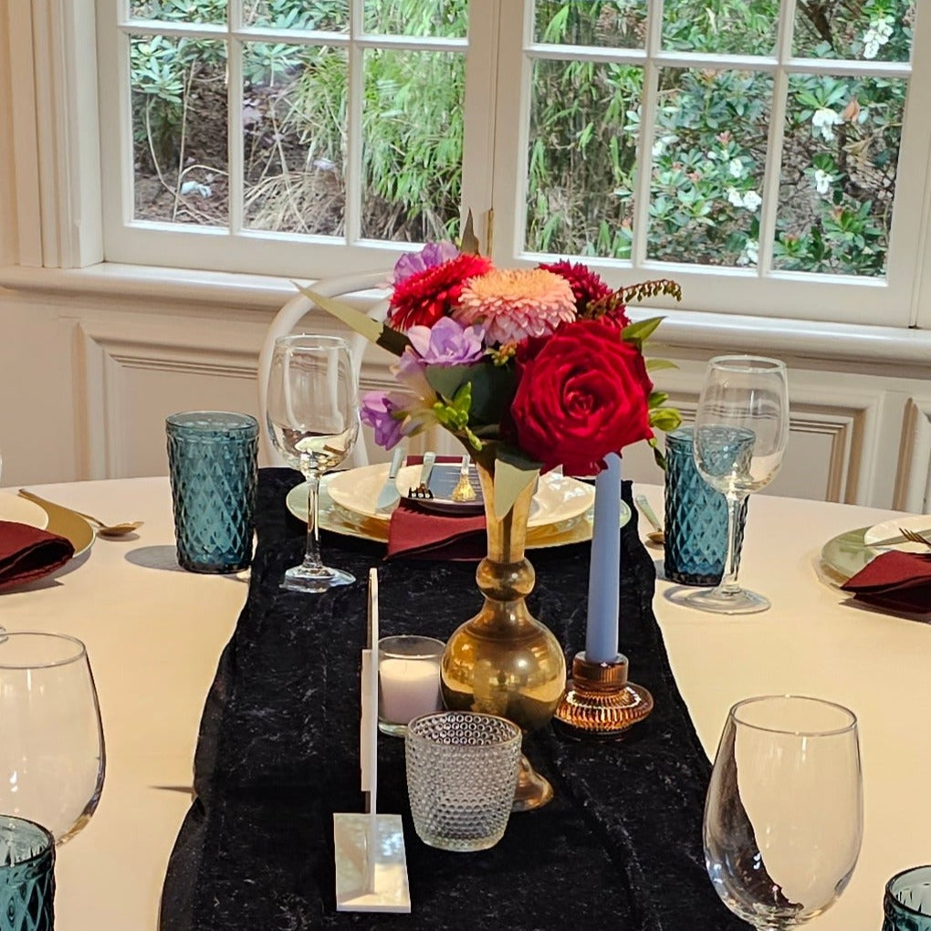 Table decoration in a brass vase