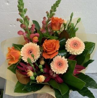 Bright bunch , gerbera, roses, Antirinum, spray carnations, leucodendrons