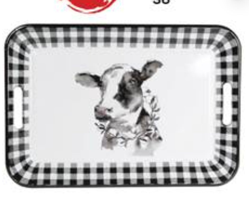 Enamel tray with cow design and black and white checkered border, 