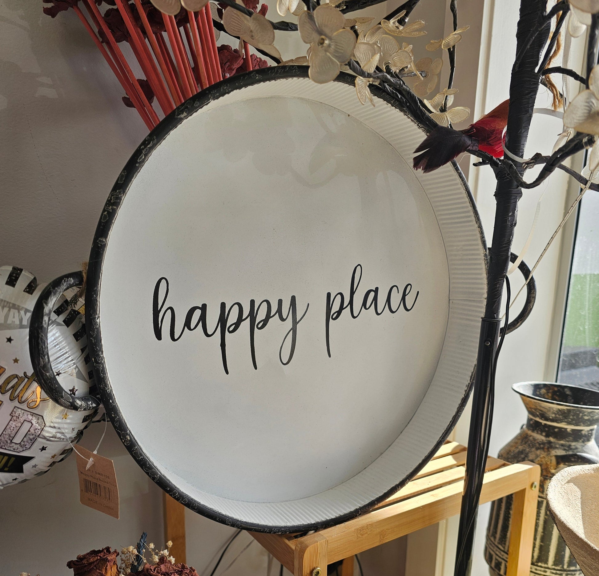 Decorative tray with 'happy place' text 