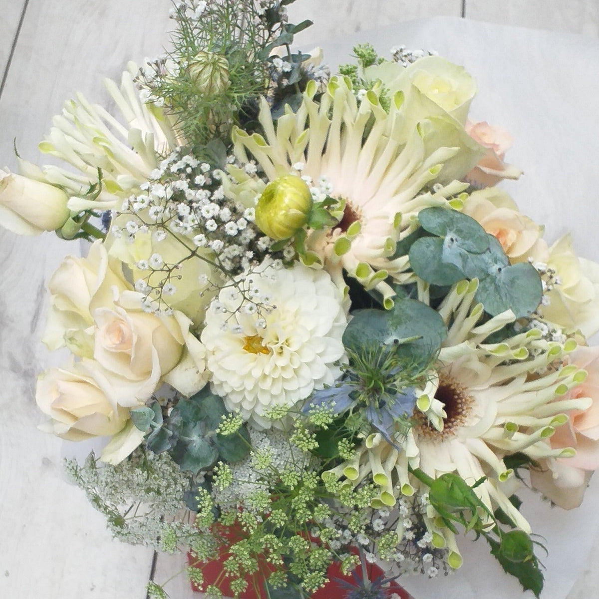 bouquet of dahlia, gerbera, queen annes lace, mini roses, gyp and baby gum
