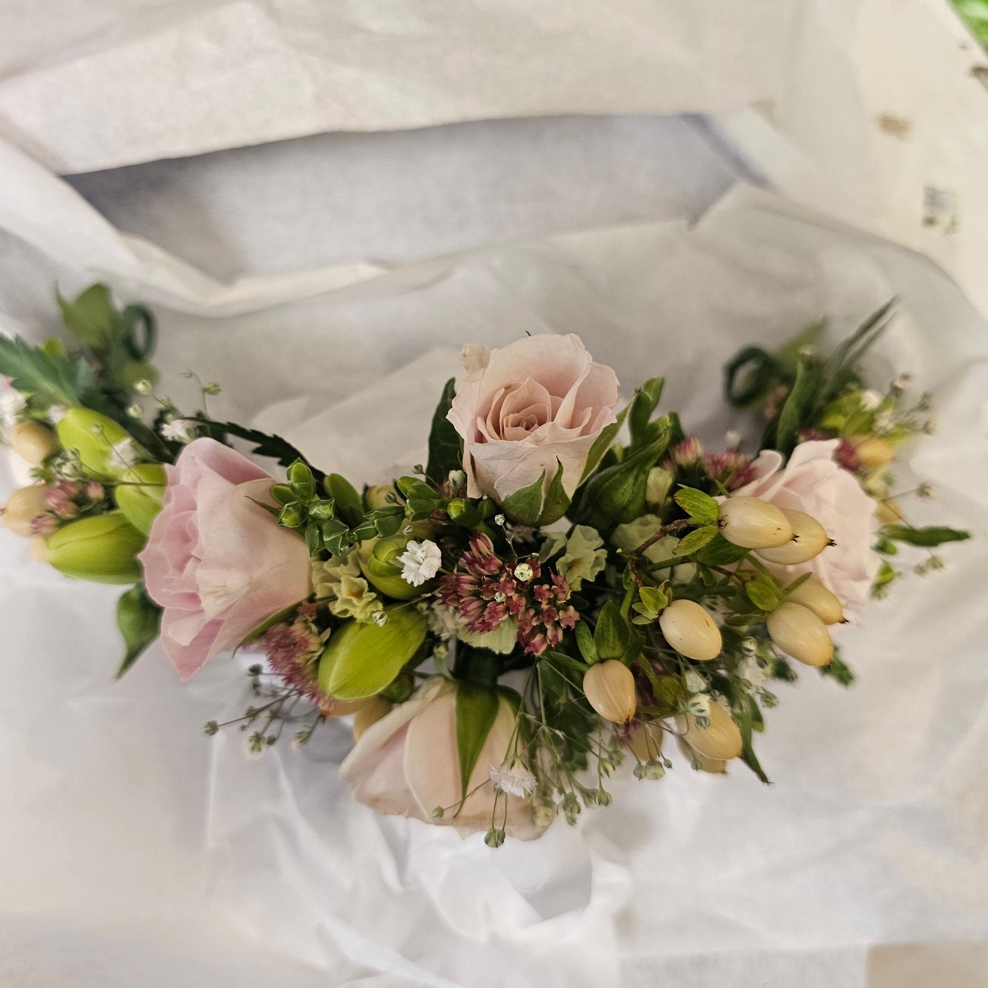 soft pink flower crown, berries, mini roe, gyp, freesia, sedum.