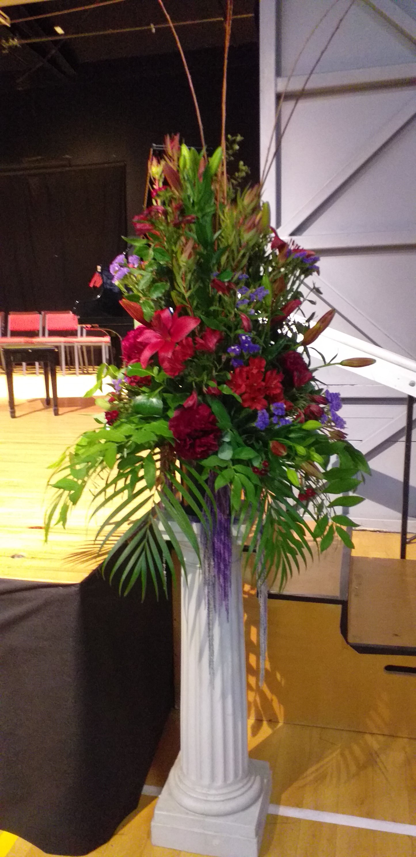 Corporate or Celebration Reception and Venue Decoration Flower Arrangements - pedestal arrangement in red and blue