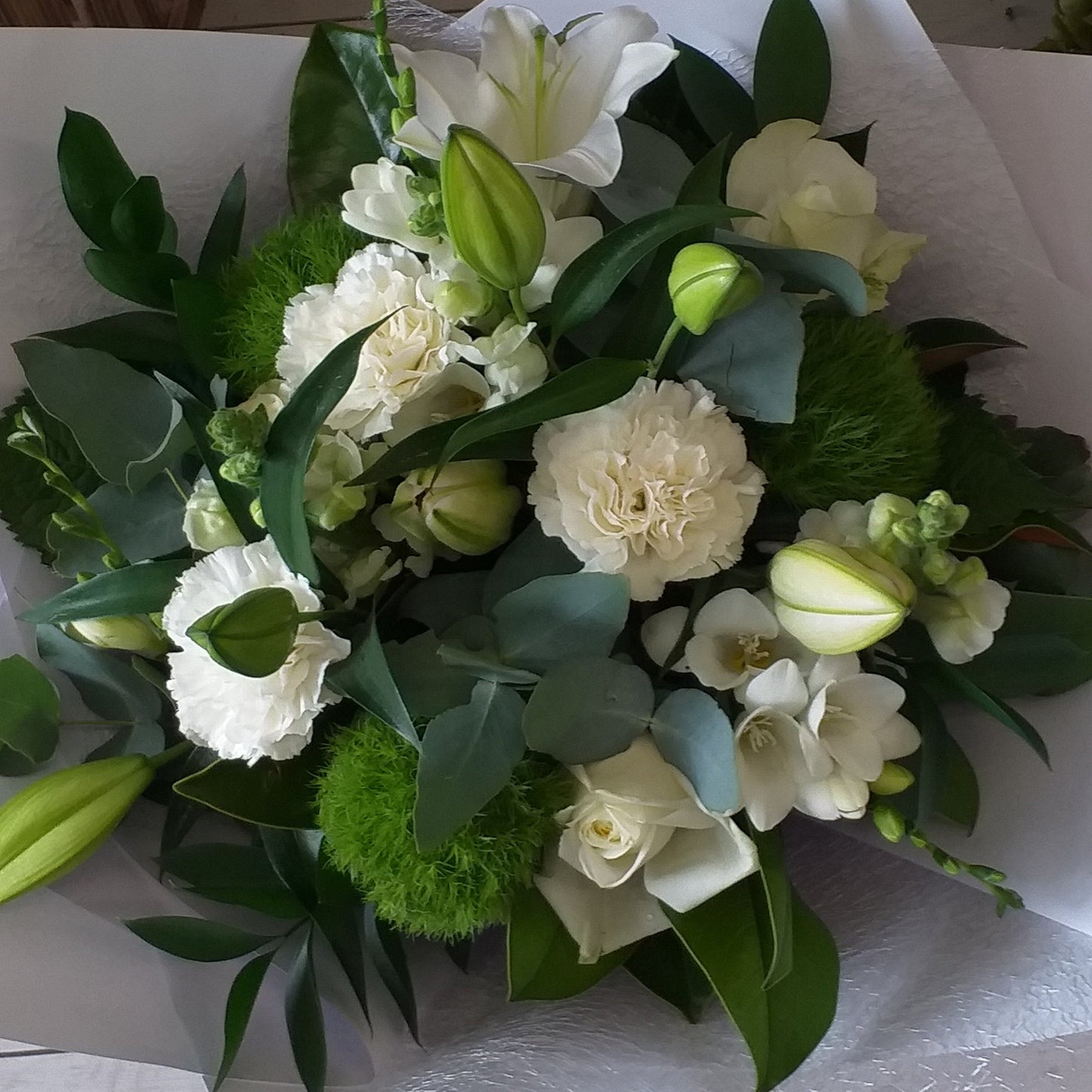 white flowers-lilies, carnations, roses, freesias, stock and green carnations