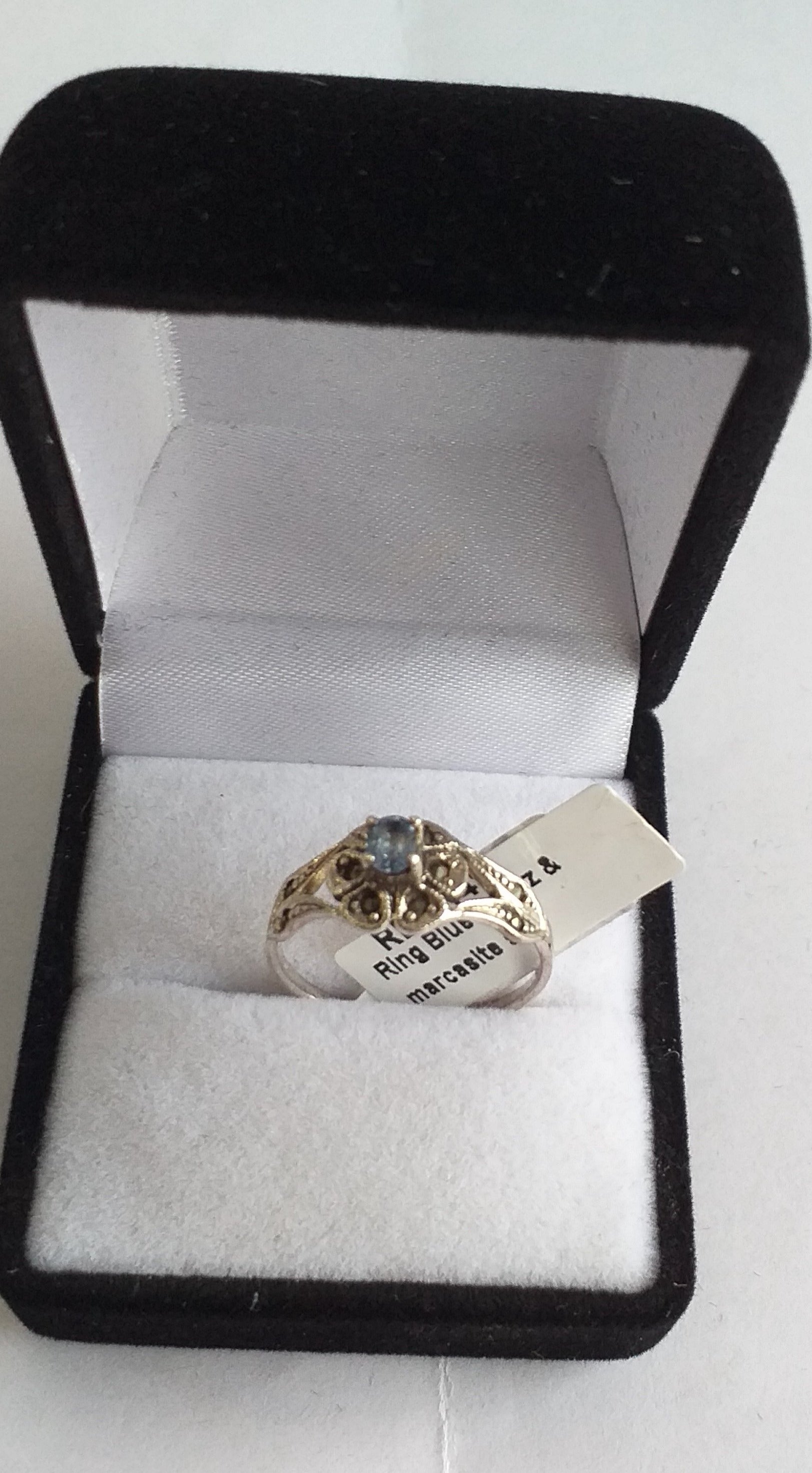 Ring, Blue Topaz and marcarsite flower style on a Sterling Silver, band - Broadfield Flowers Florist Lincoln
