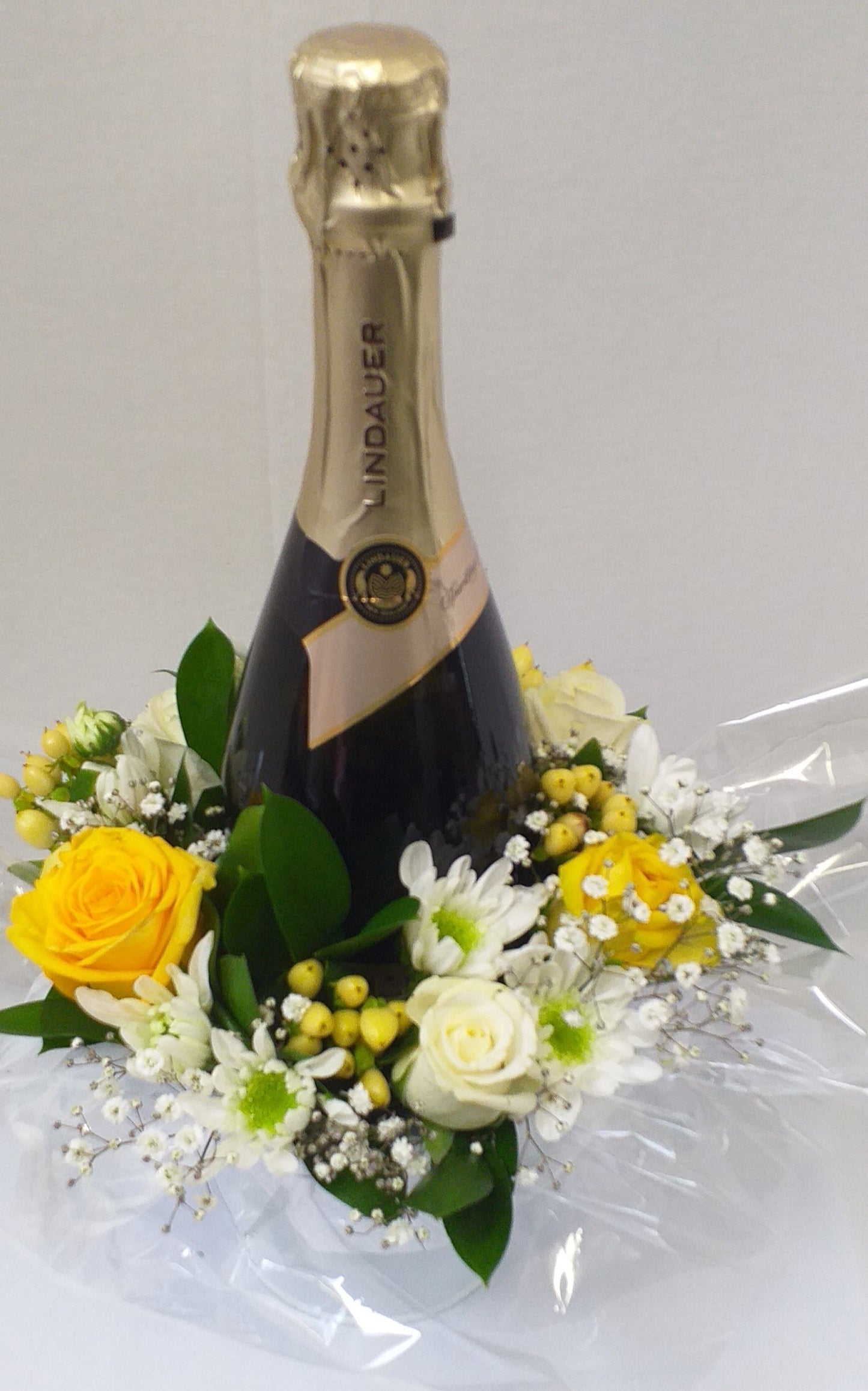 Bucket or box of champagne or wine, decorated with flowers
