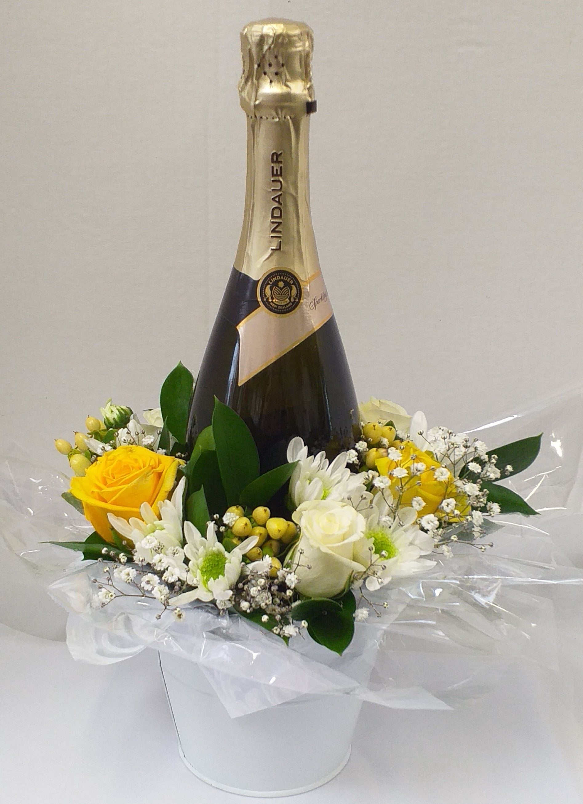 Gift box or bucket of wine and flowers, you tell us what you want and we go and buy it for you