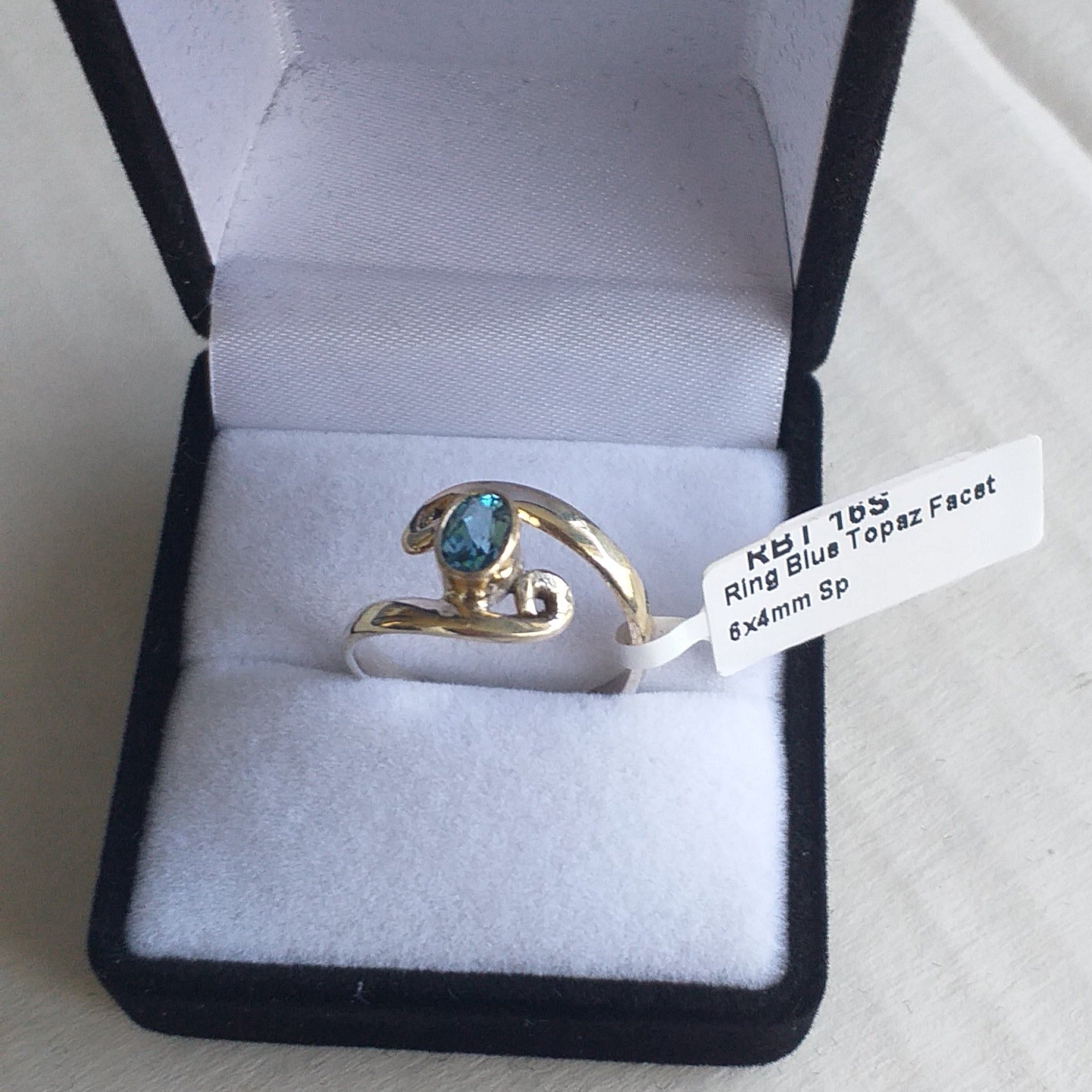 Ring, Blue Topaz spiral band in Sterling Silver, - Broadfield Flowers Florist Lincoln
