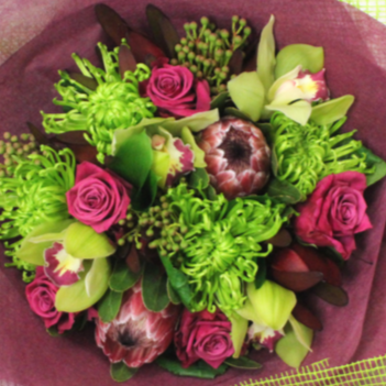 Funkalicious flower bouquet, green chrysthemum, pink proteas, roses, green orchids, wrapped in green and pink