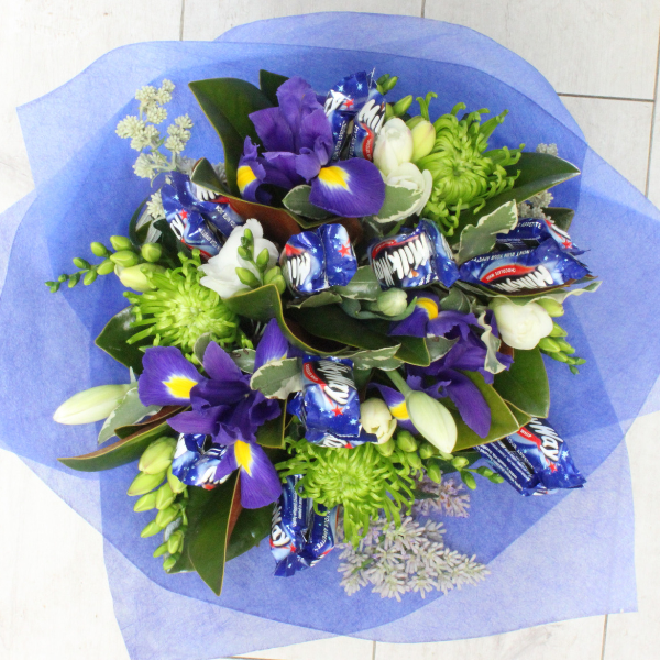 Milkyway flower chocolate bouquet, blue, purple, white, green. freesias, iris, chrysanthemum, roses, tulip Broadfield Flowers Florist Lincoln