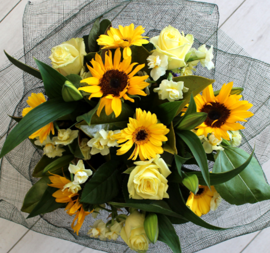 Springtime flower bouquet with sunflowers, early cheer, roses, gerberas, lillies- Broadfield Flowers Florist Lincoln