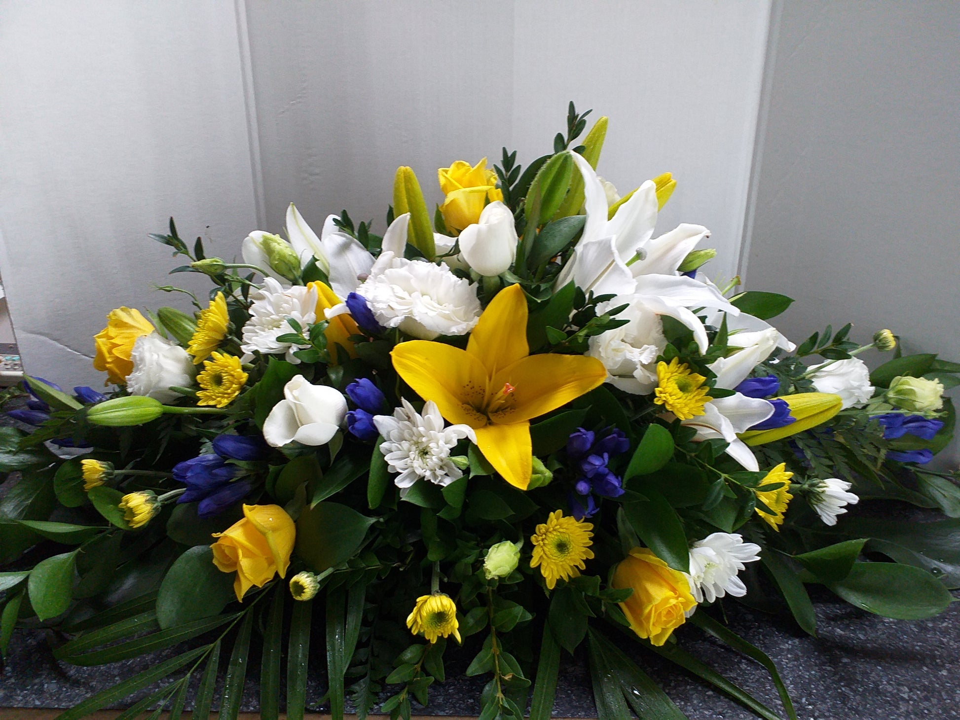 Casket spray yellow and white - Broadfield Flowers Florist Lincoln